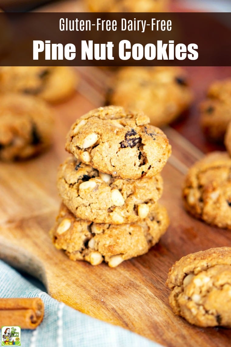 Pine Nut Cookies on a wooden cutting board.