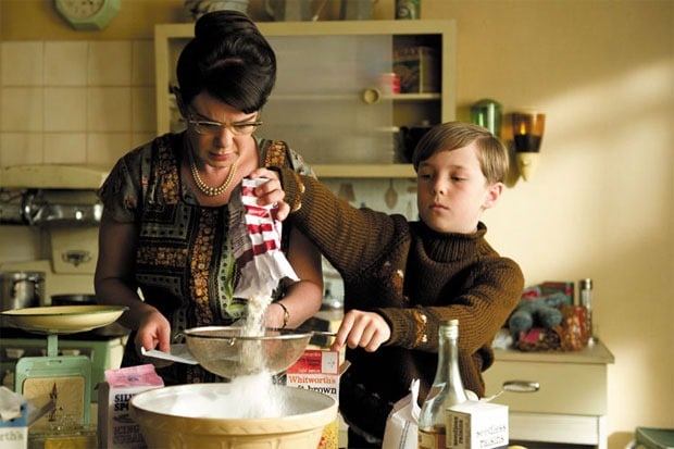 Still from Toast the movie of Nigel cooking with his mum in their kitchen.