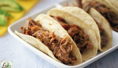 Need a recipe for Taco Tuesday or Family Taco Night? Try this Best Slow Cooker Spicy Pulled Pork Tacos recipe. Super easy Mexican pulled pork crock-pot recipe and great for parties, too!