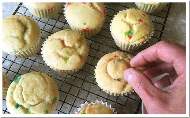 Making filled cupcakes: placing the lid over the hole.