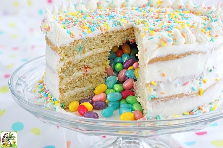 Surprise Inside Jelly Bean Cake on a glass cake stand.