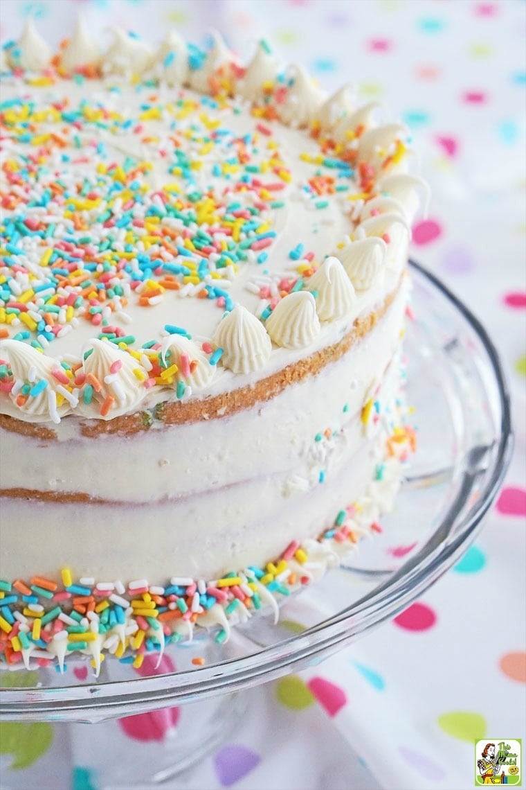 Frosted white plate on a glass cake stand.