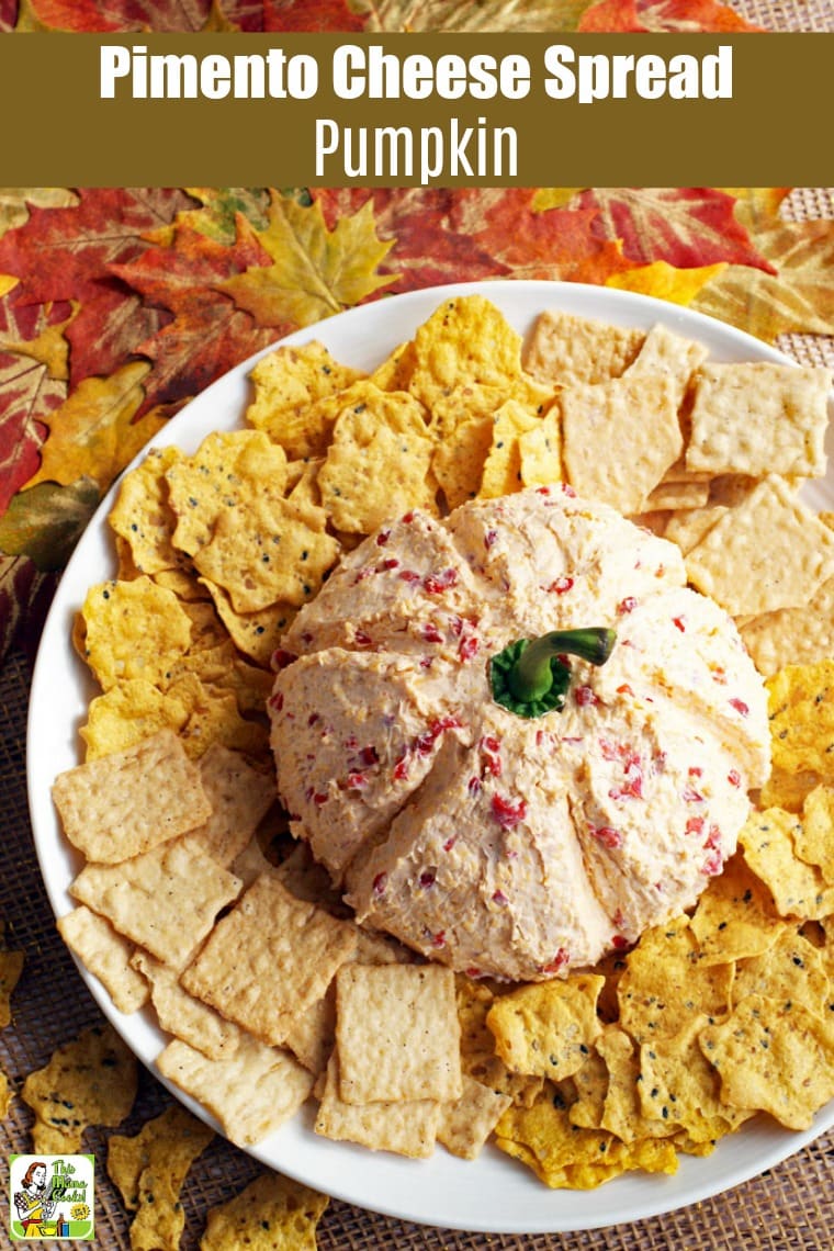Pimento Cheese Pumpkin with crackers on a white plate.