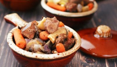 Bowls of slow cooker venison stew with root vegetables.