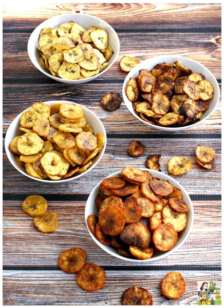 Four white bowls of baked plantain chips flavored four ways.