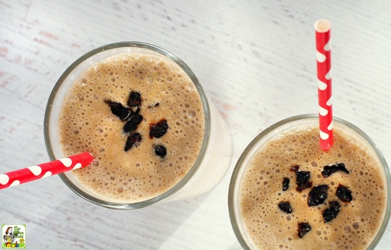 Two Healthy Banana Smoothies in glasses with red straws.