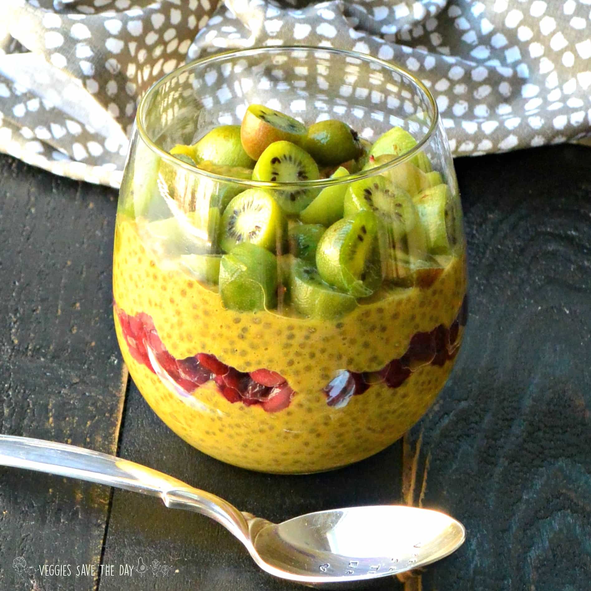 A cup of Pumpkin Pie Chia Pudding and spoon.