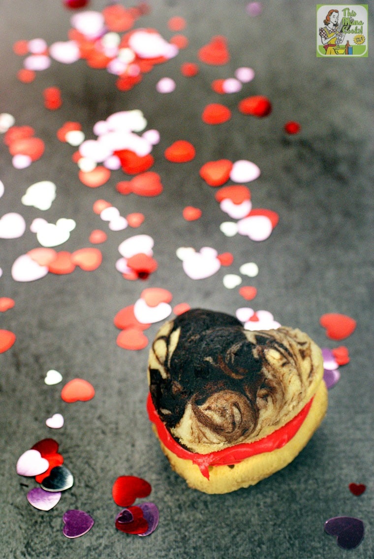 A heart shaped cake mix whoopie pie with red filing.