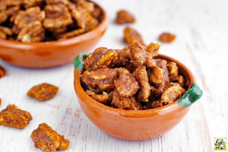 Two ceramic bowls of Candied Pecans.