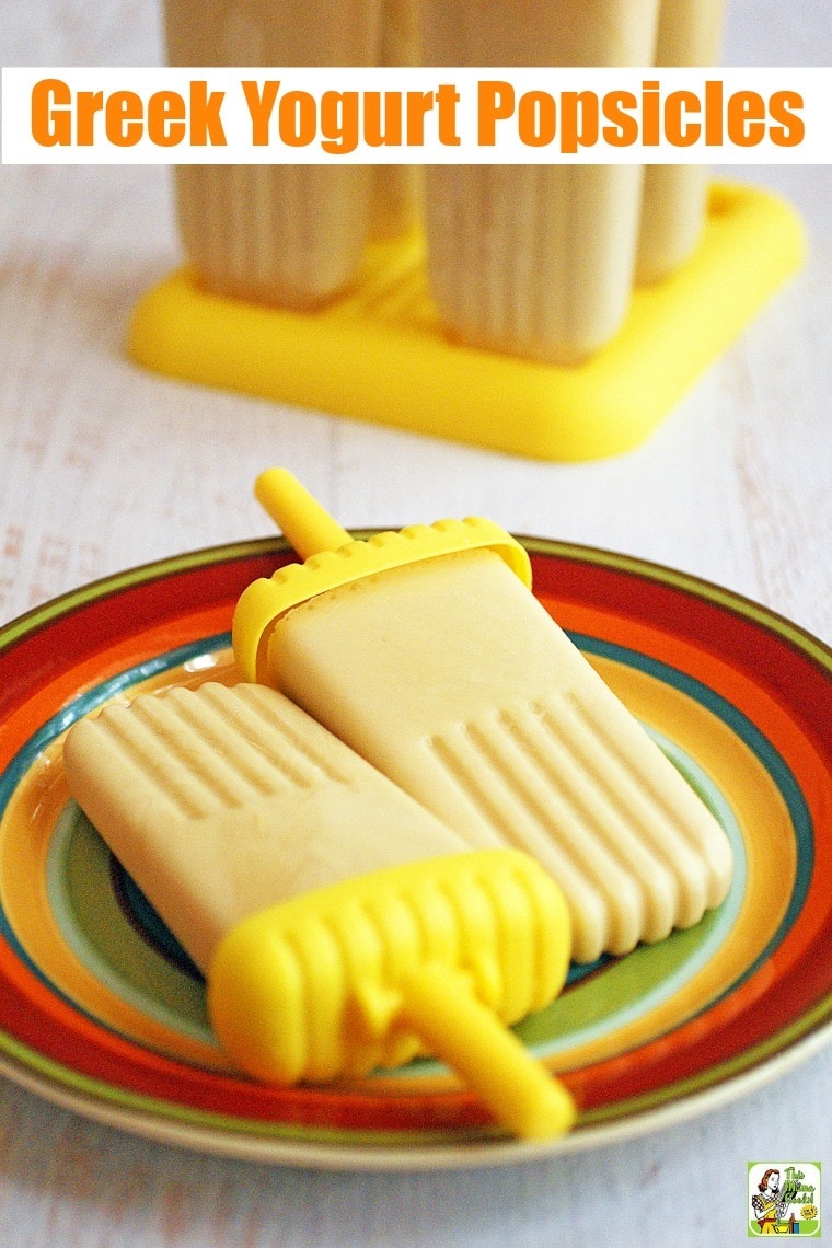 Two Yogurt Popsicles on a colorful plate with more frozen yogurt pops in a holder in the background.