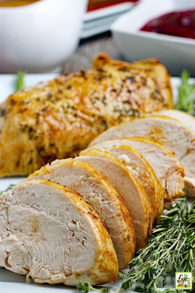 Sliced and roasted turkey breast with herbs. 