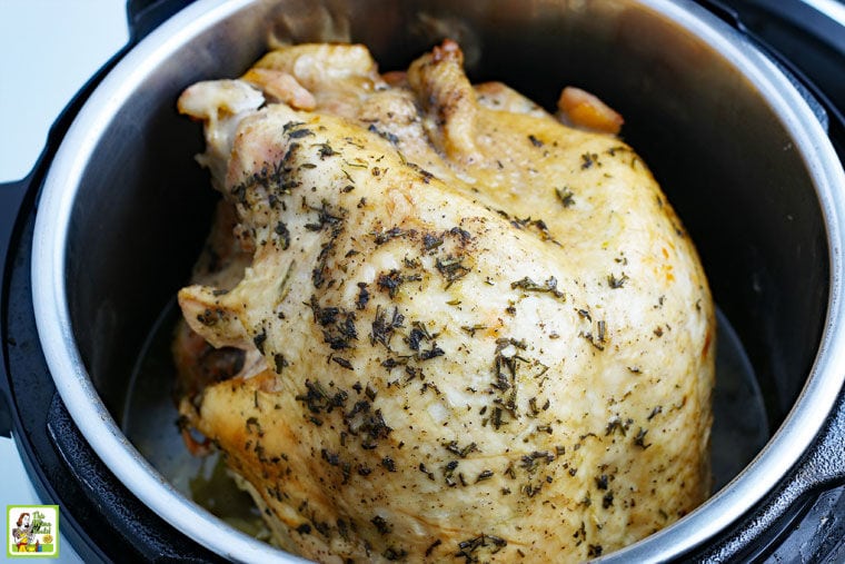 A whole cooked chicken in an pressure cooker Instant Pot.