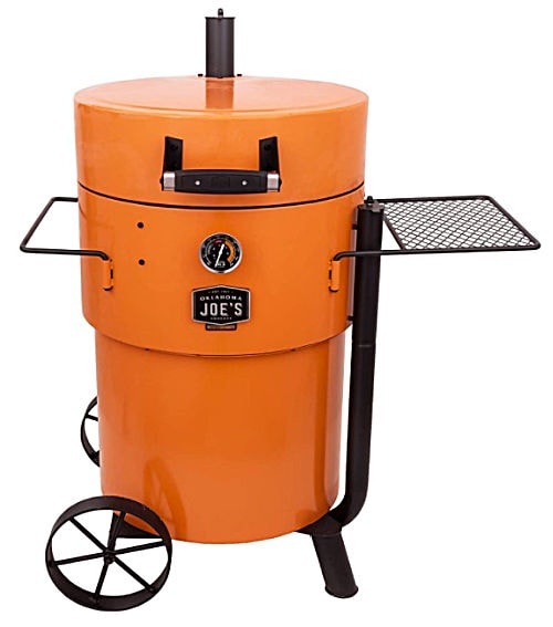 An orange barrel shaped Oklahoma Joe’s 19202100 Bronco Pro Drum Smoker.