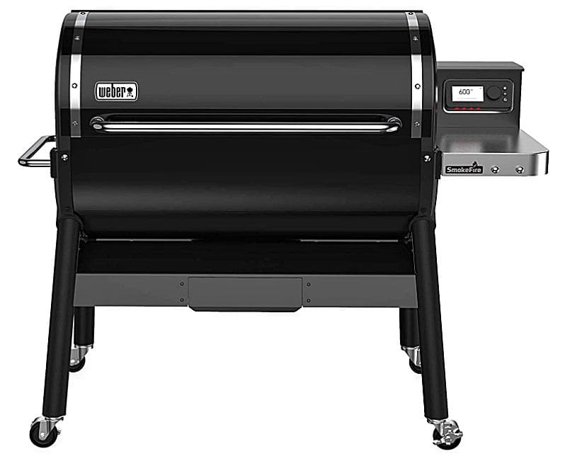 A large black Weber SmokeFire EX6 (2nd Gen) Wood Fired Pellet Grill with wheels.