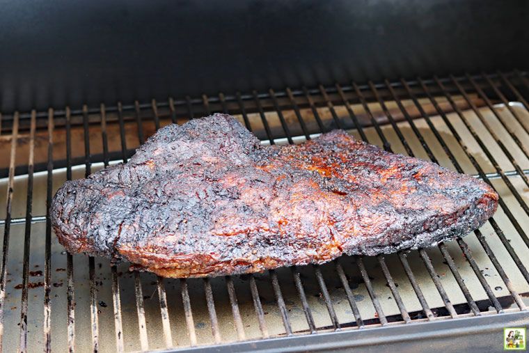 Cooking brisket for 8 hours on a Traeger smoker.